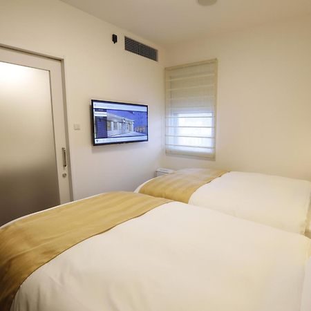 Hotel Sunroute Sopra Kobe Annesso מראה חיצוני תמונה